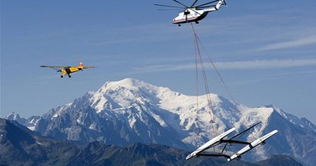 Alinghi's boat flown over Alps to reach the sea